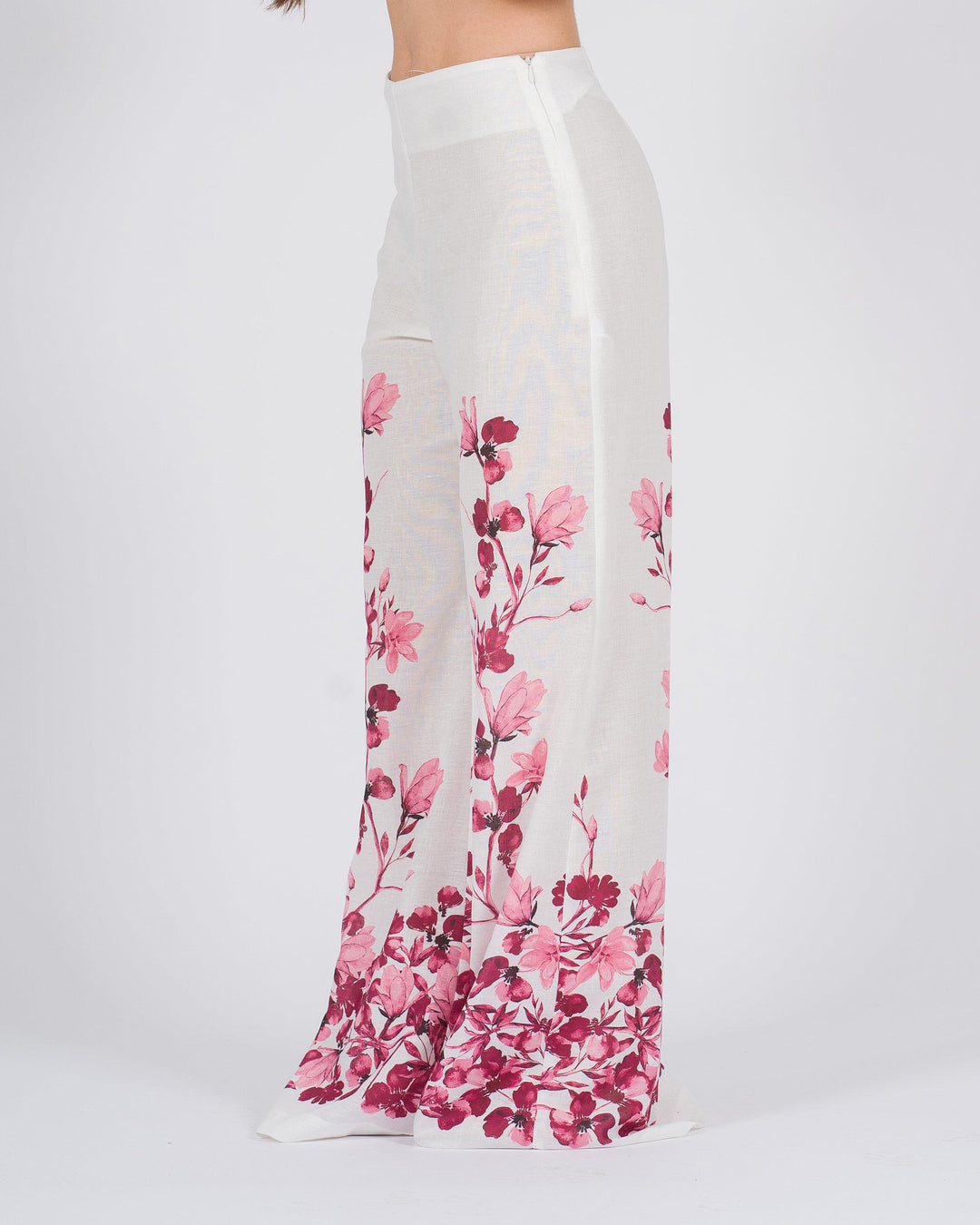 Pantalone Palazzo bianco con stampa floreale fucsia 