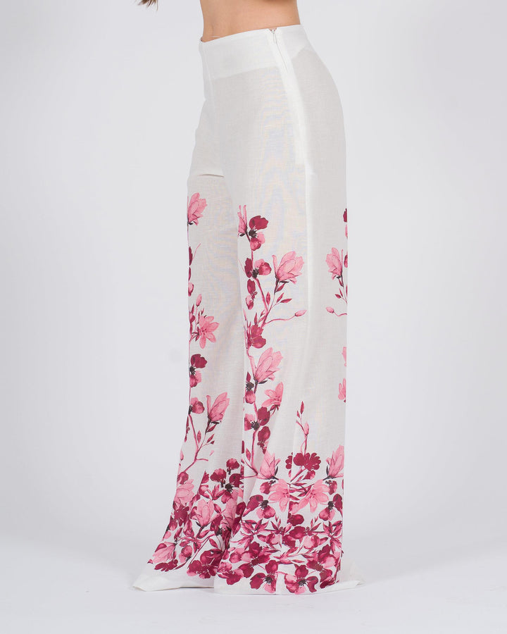 Pantalone Palazzo bianco con stampa floreale fucsia 