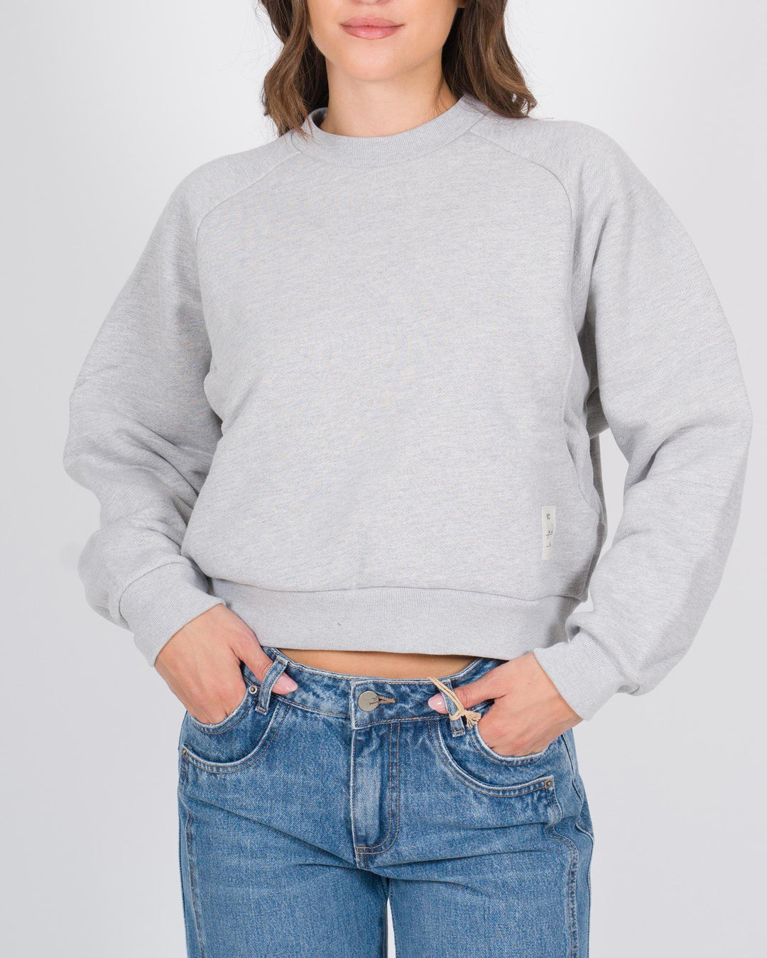 Felpa cropped grigia con maniche raglan 